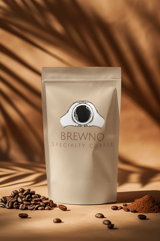 Brewno specialty coffee package with coffee beans and grounds on a warm brown background