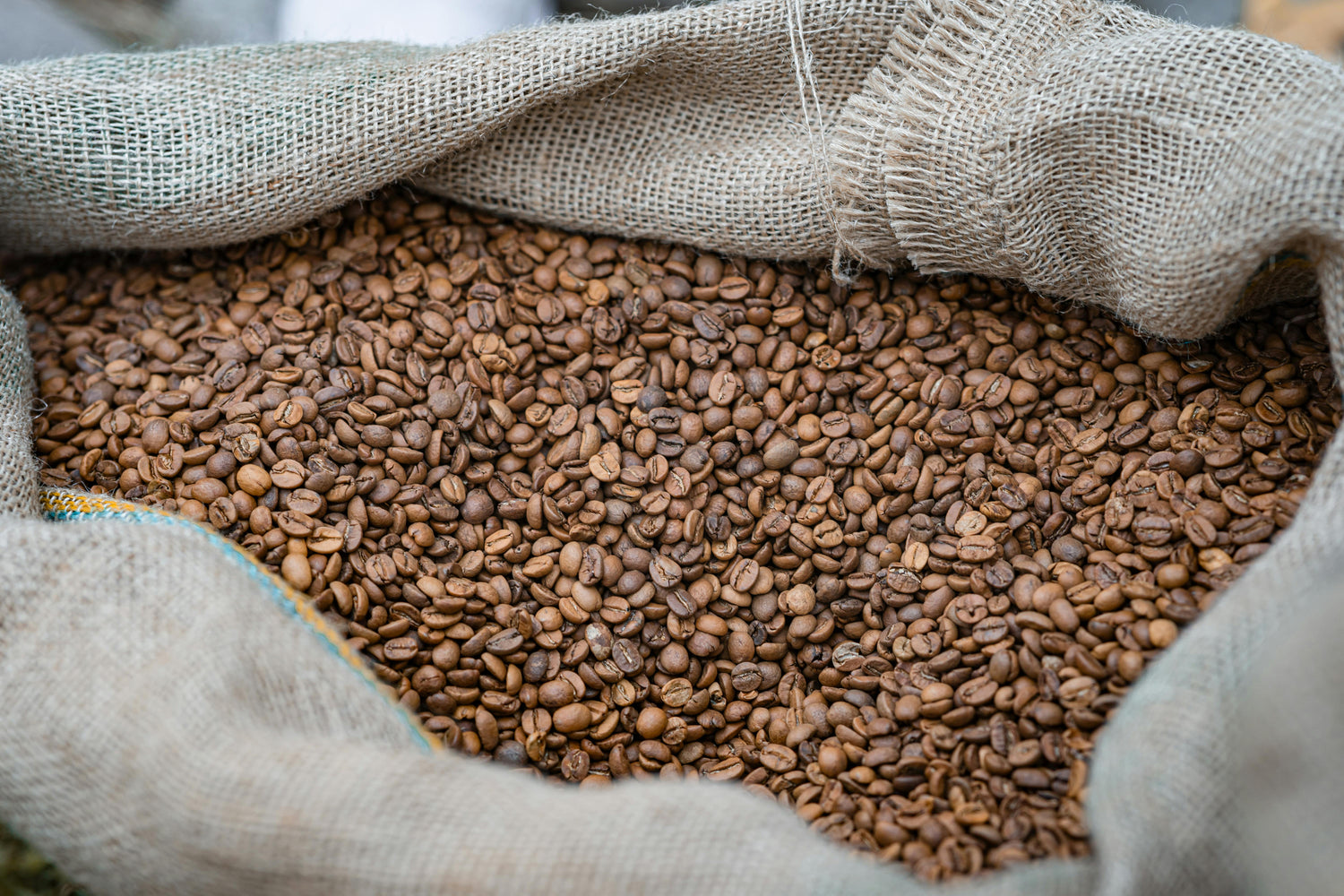 Sack filled with roasted coffee beans